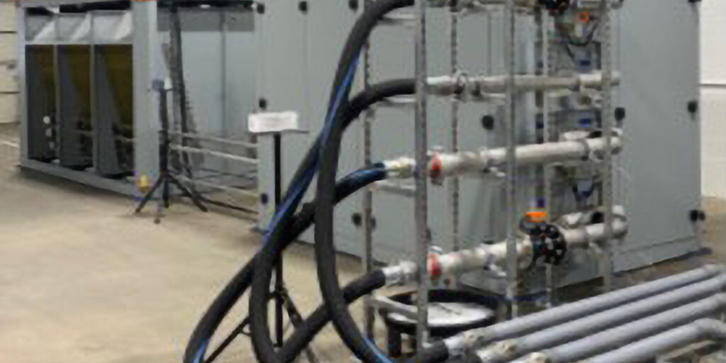 CO₂-based electric heat pump system designed for commercial water heating